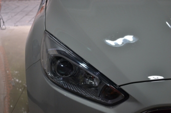 15福克斯车灯改装海拉透镜欧司朗氙气灯